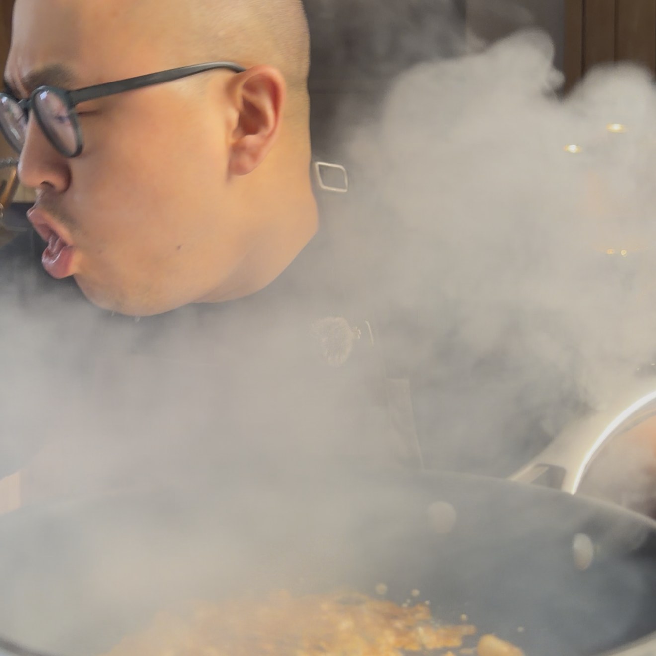 Blooming fish sauce in a screaming hot wok