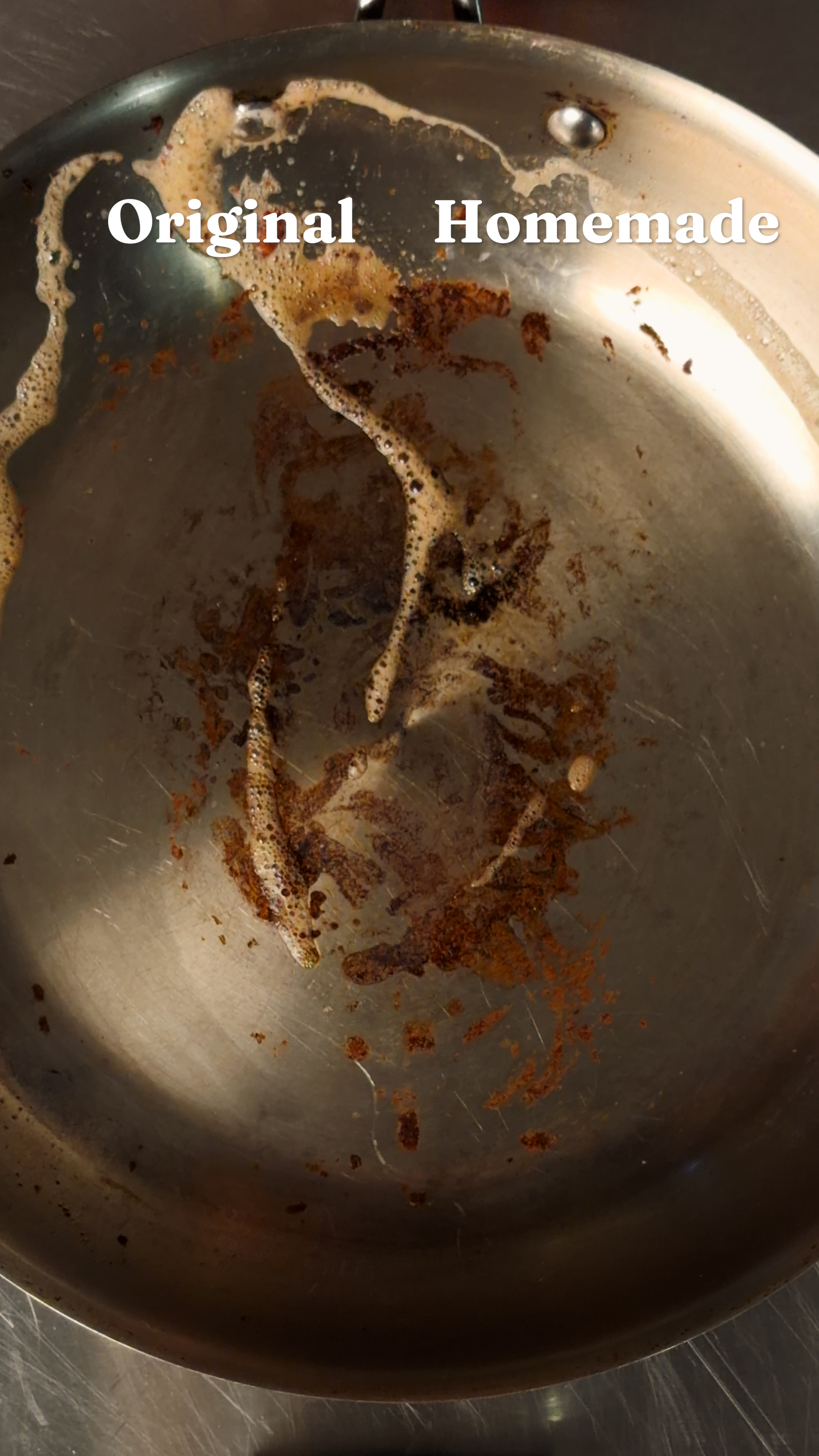 The same pan after scrubbing and wiping, both halves showing similar amounts of remaining residue