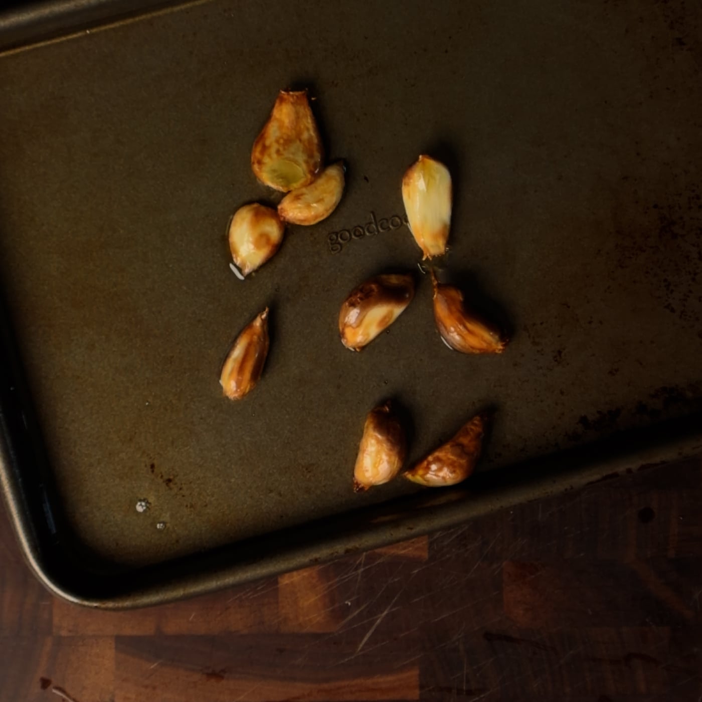 Whole cloves of roasted garlic, golden and soft, ready to be mashed into a paste