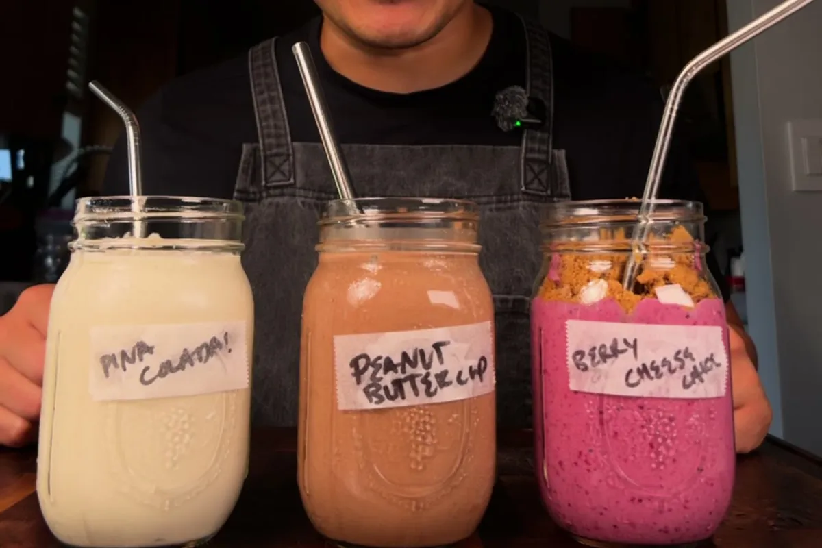 Three finished smoothies: pina colada, peanut butter cup, and berry cheesecake