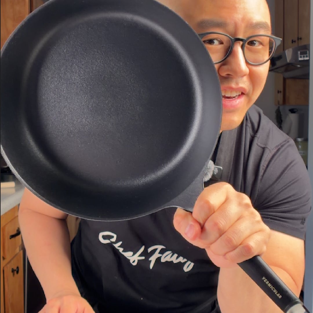 Chef Fatty holding up a Vermicular thin enameled cast iron frying pan